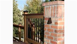 DeKor_Round_Aluminum_Deck_Balusters_Installed_Brick_Porch_Column_With_Rondi_Tear_Drop_LED_Lamp_Fixture