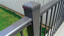 Solutions_Aluminum_Railing_Systems_PTP_Post_To_Post_Level_Bronze_4x4_Posts_Close_Up_Bracket_Cap_Round
